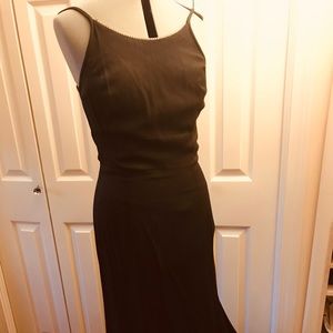 Black evening/prom gown with train.  Cubic studded neckline, low cut back.